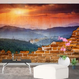 Photo murales coucher de soleil dans les montagnes mur cassé
